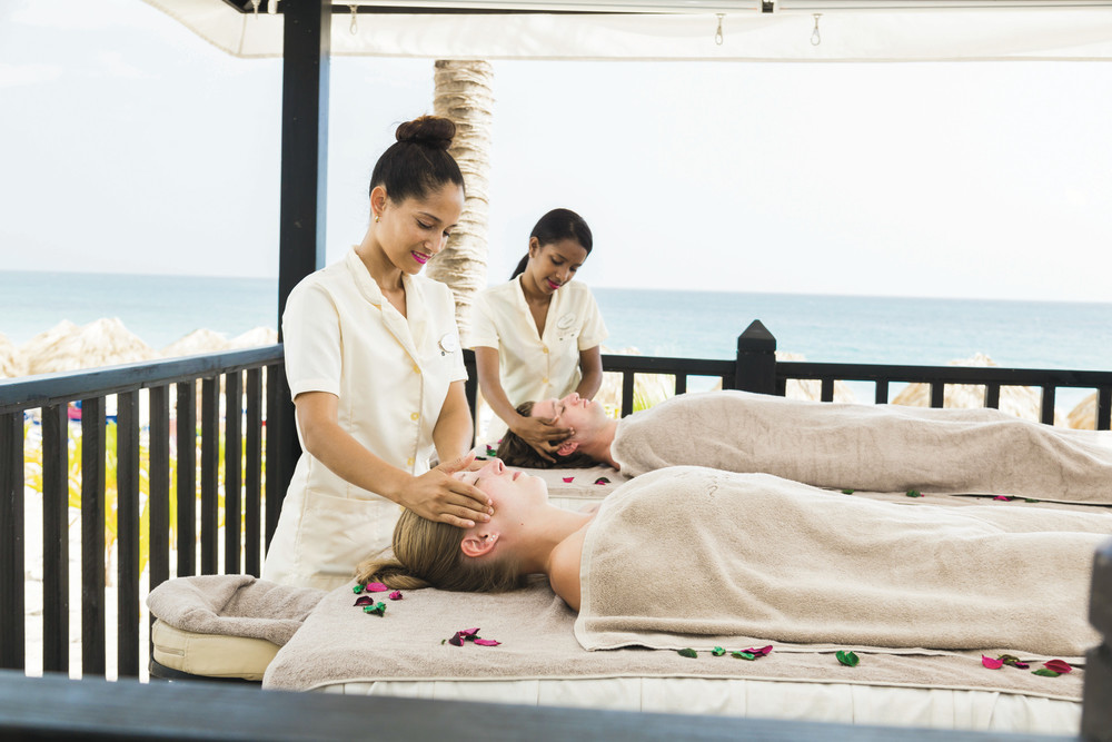 Take a break with a massage by the beach at RIU