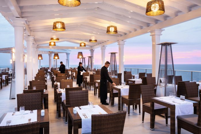 Enjoy the terrace of the Riu Vistamar hotel's main restaurant