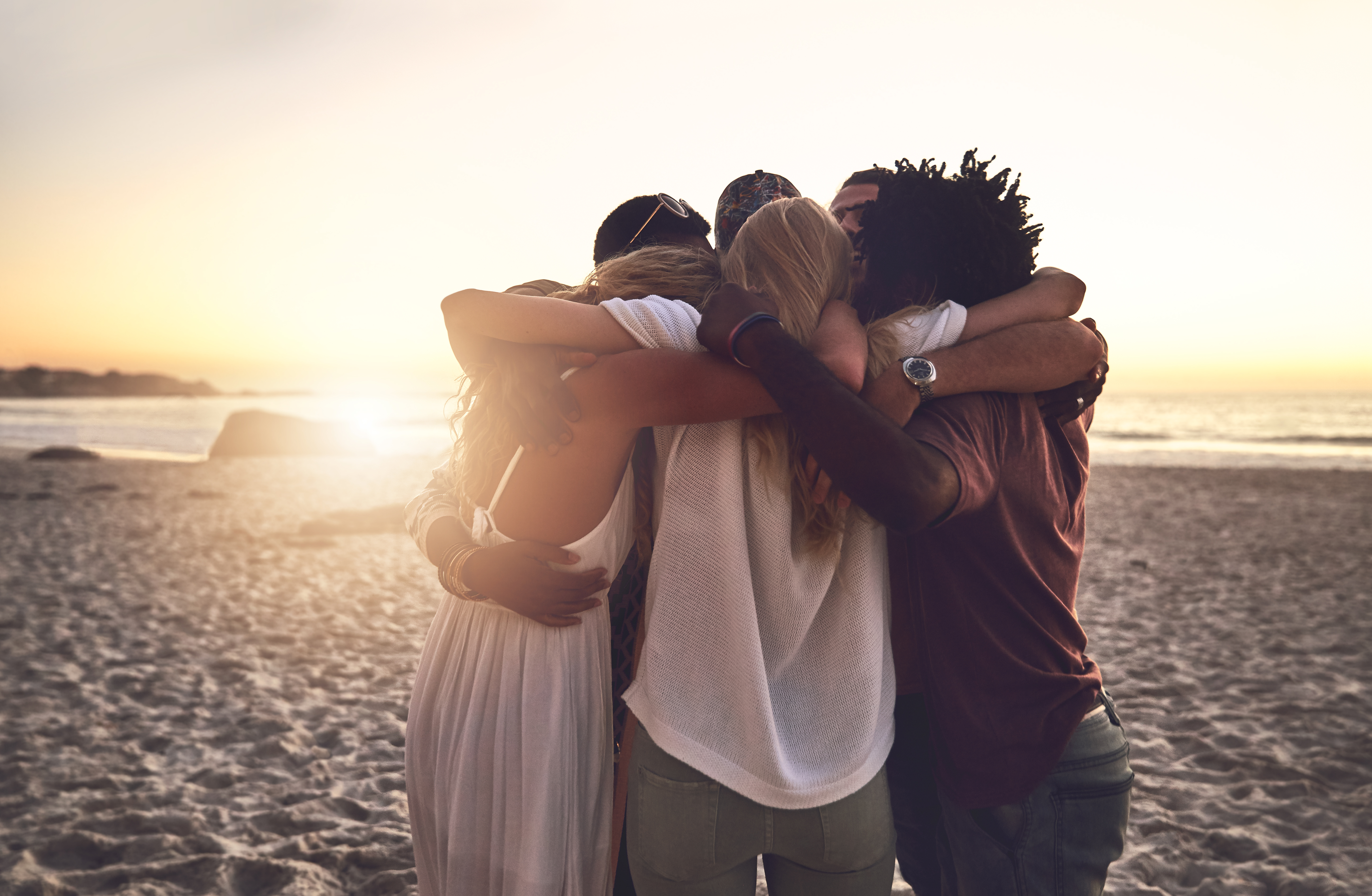 friends hugging silhouette