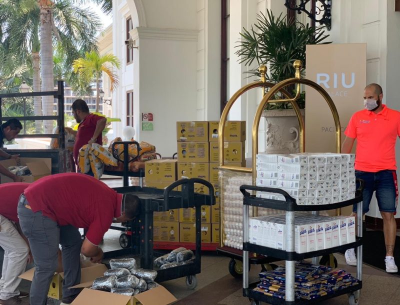 Employees at the Riu Palace Pacífico hotel in Mexico collect food to donate to social organisations