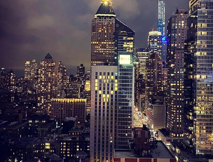 The Riu Plaza New York Times Square hotel, shining with an illuminated heart of solidarity to support those affected by the coronavirus