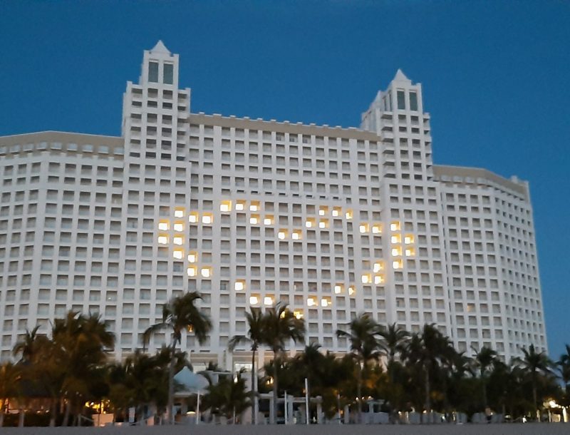 The façade of the Riu Emerald Bay hotel illuminated due to the fight against the coronavirus