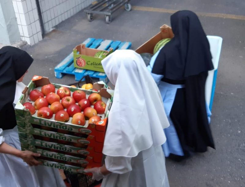 The employees of the RIU hotels in Costa Rica transfer fruit and vegetables to the parish of Alajuela in response to the COVID-19 epidemic