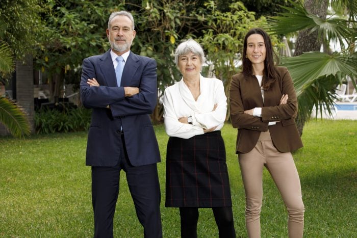 Three members of the Riu family: Carmen and Luis Riu, the owners, and Naomi Riu, the next generation