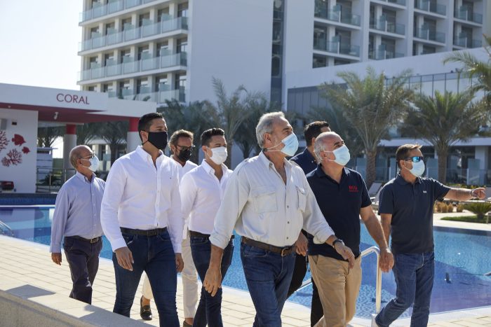 Luis Riu goes over the details of the Riu Dubai with his Operations team before the opening