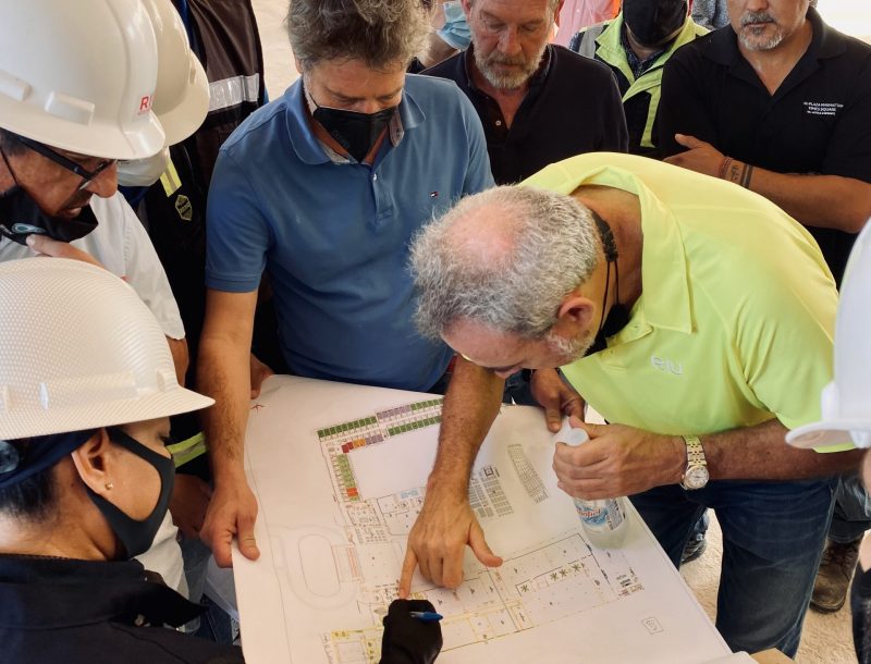 Luis Riu looks at the floorplans at the end of the construction works of the Hotel Riu Latino in Cancún, Mexico, in 2022