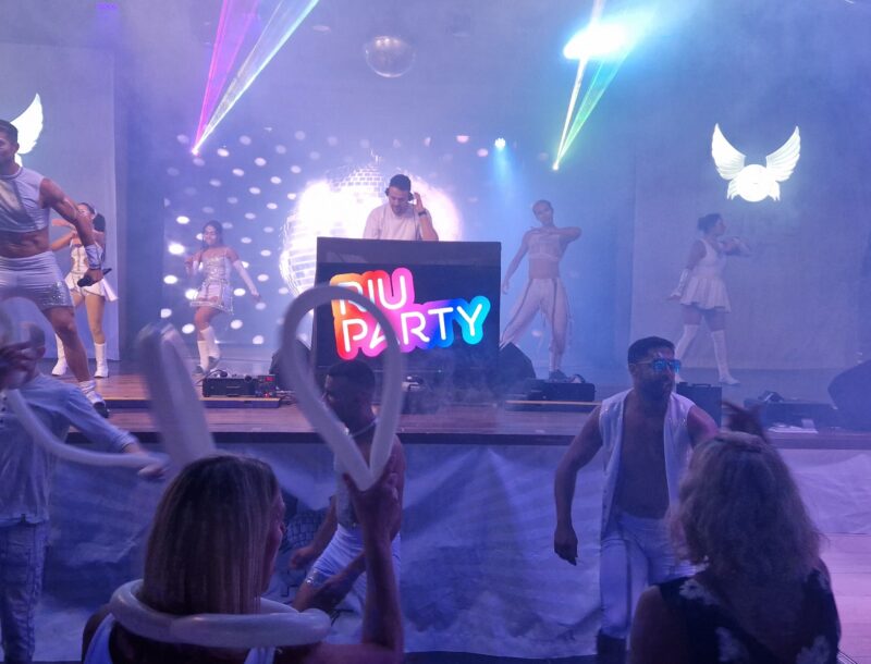 DJ and dancers at the Riu White Party at the hotel Riu Buenavista in Tenerife.