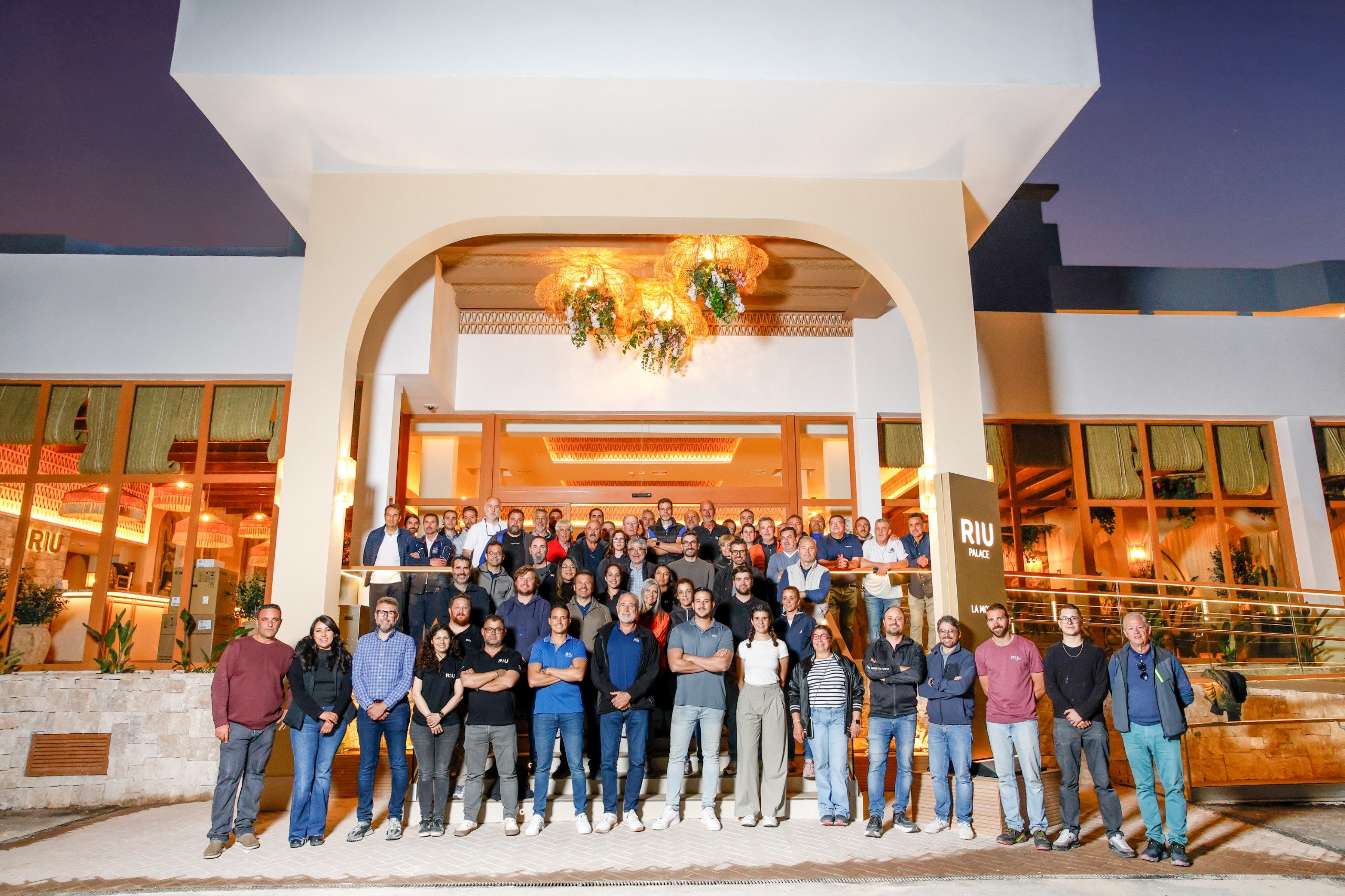 Luis Riu Güell, Luis Riu Rodríguez and Roberto Riu together with the team responsible for the construction and opening of the Hotel Riu Palace La Mola in Formentera