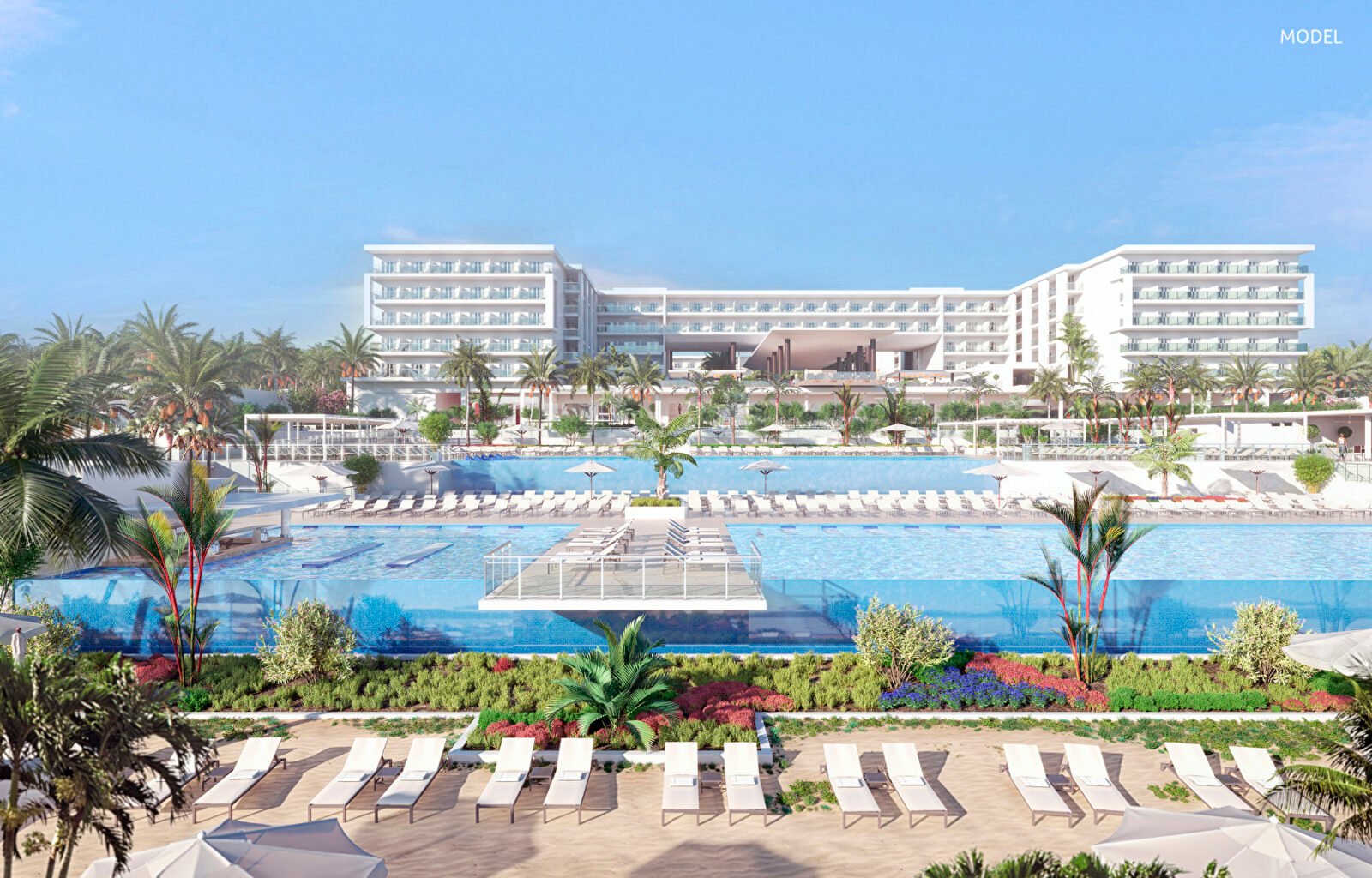 Zona de piscinas y fachada del hotel Riu Palace Swahili en Zanzíbar