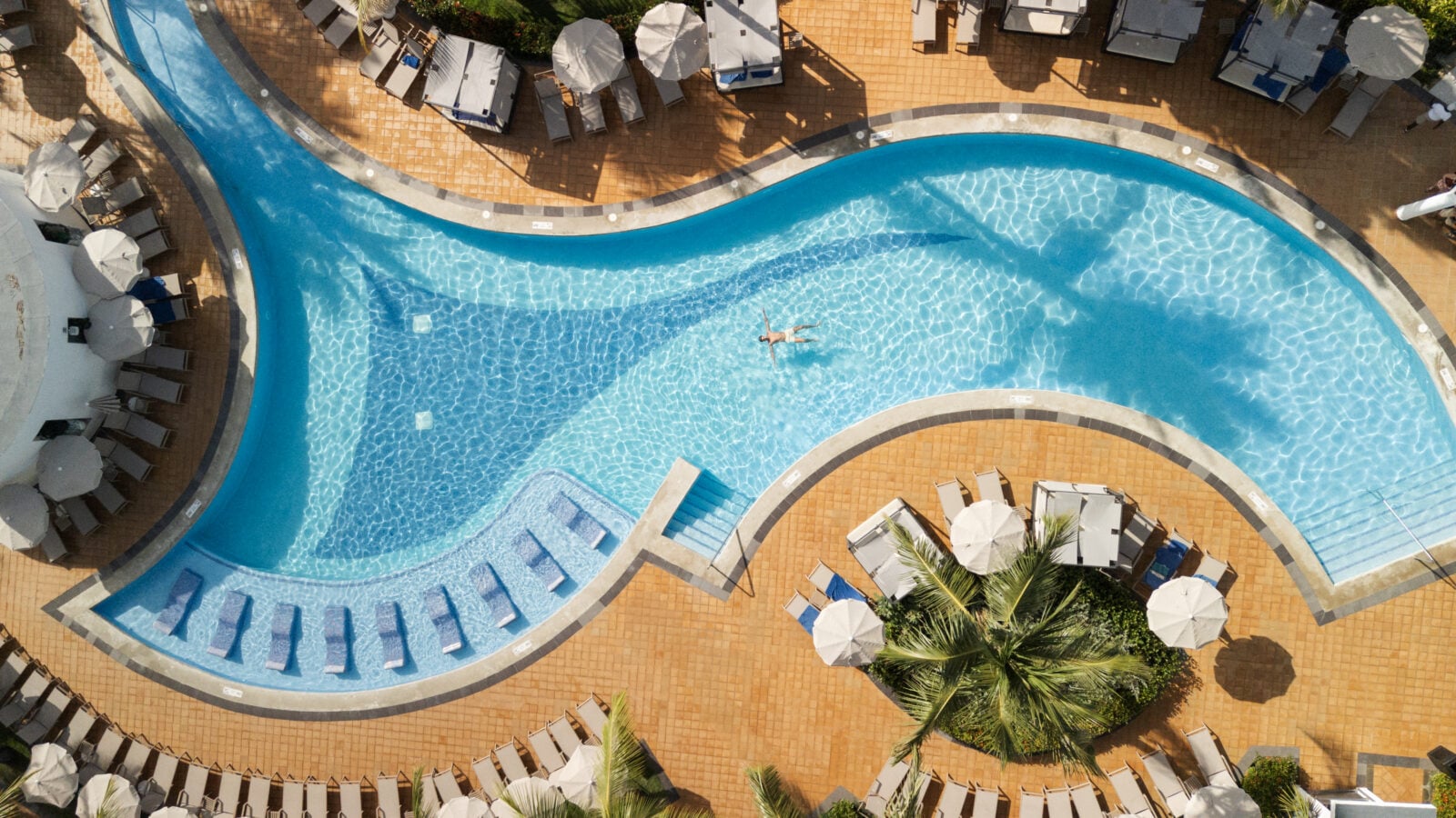 Aerial view of the swimming pool at the Riu Palace Bavaro hotel in Punta Cana. 