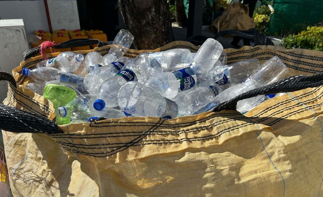 A huge bag with plastic bottles inside