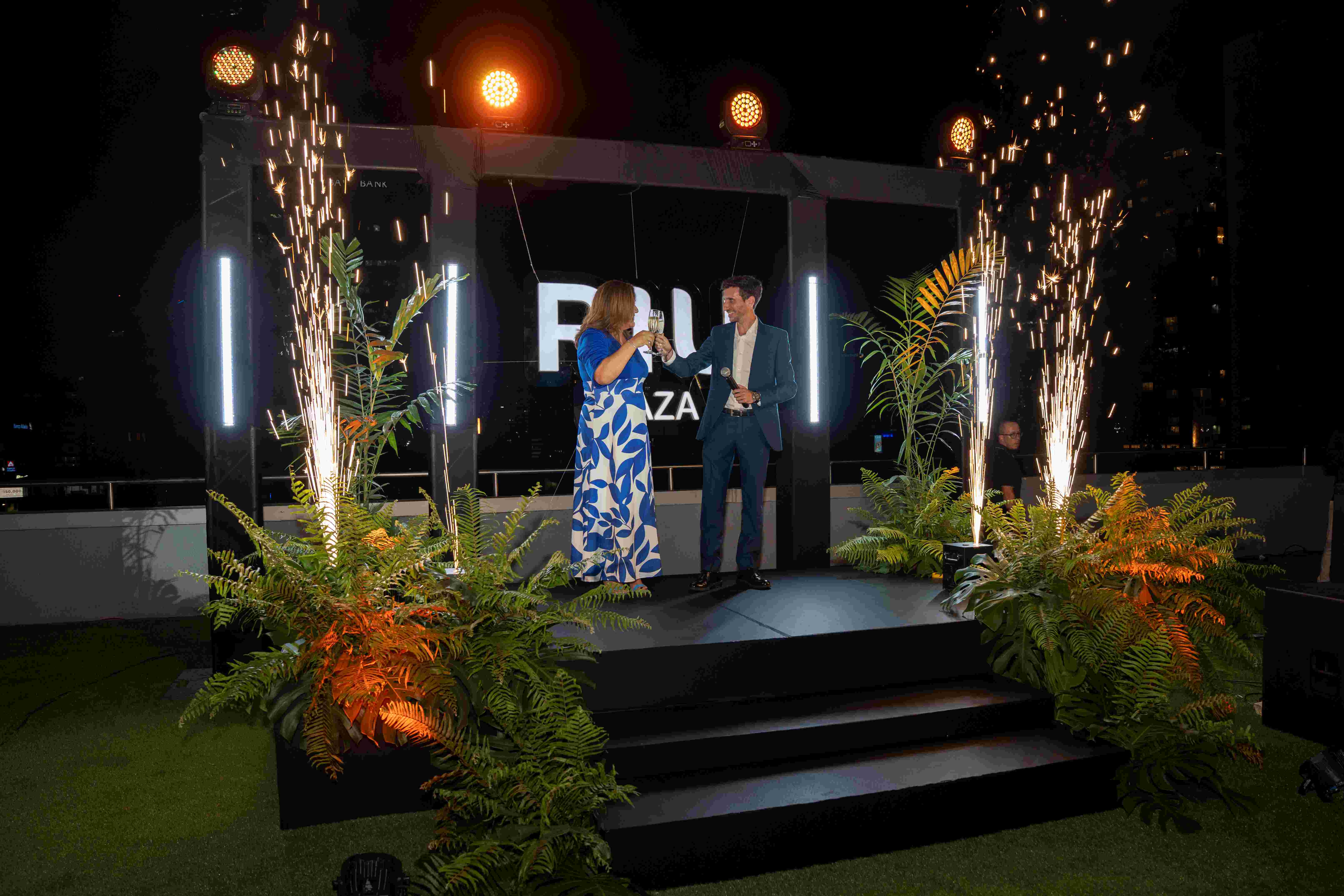 How does Riu Plaza Panama celebrate its 15th anniversary and its social impact in the country?